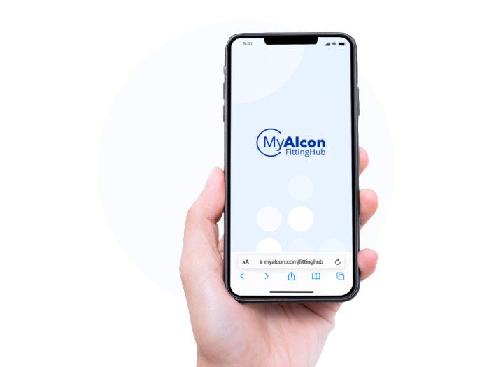 A hand holding a smartphone displaying the MyAlcon FittingHub website on the screen. The background is white with circular design elements.